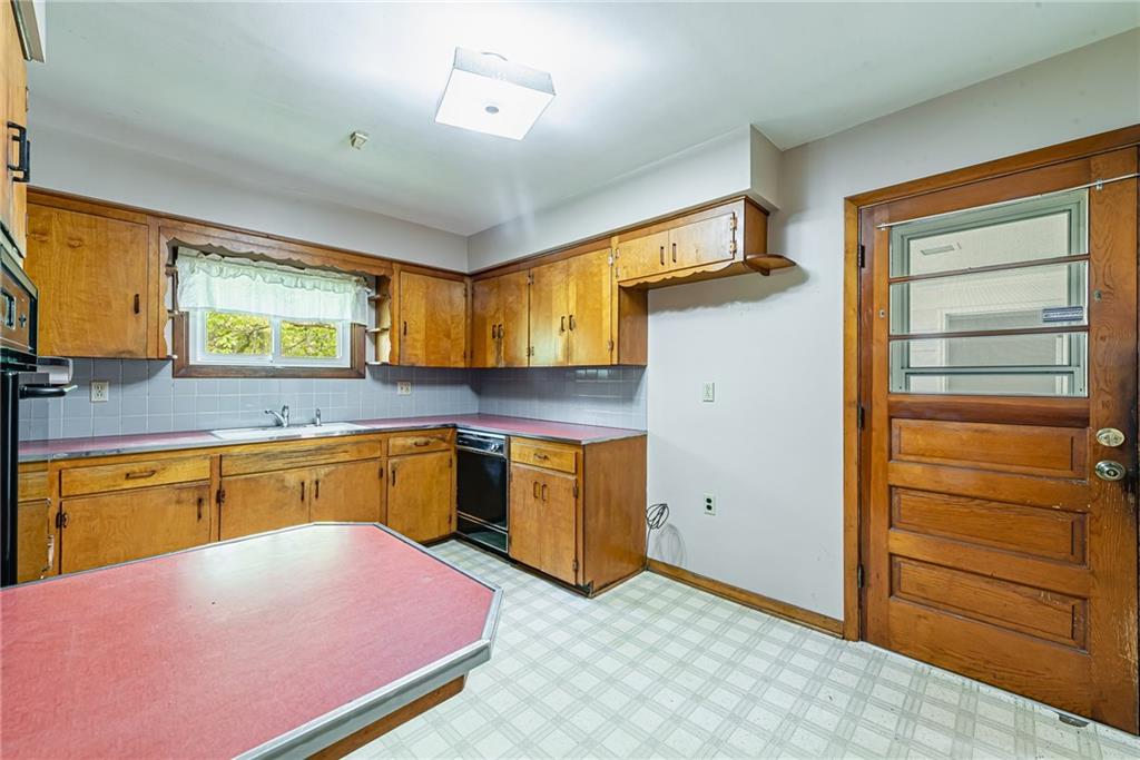 520 North 9th Street Indiana, PA 15701 - Photo 14 of 29 a kitchen with granite countertop cabinets and appliances