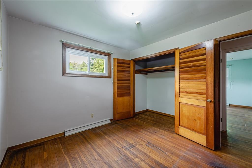 520 North 9th Street Indiana, PA 15701 - Photo 21 of 29 an empty room with wooden floor and closet