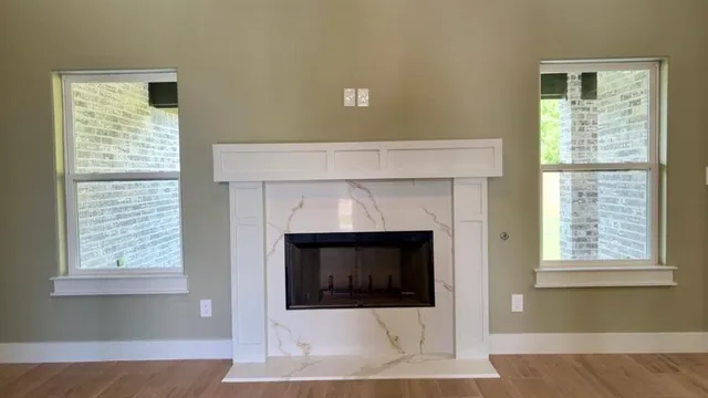 a white building with a fireplace