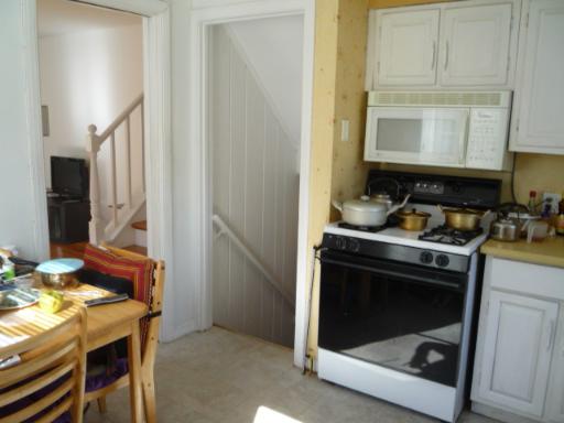711 Long Road Glenview, IL 60025 - Photo 3 of 9 a kitchen with a stove and a microwave