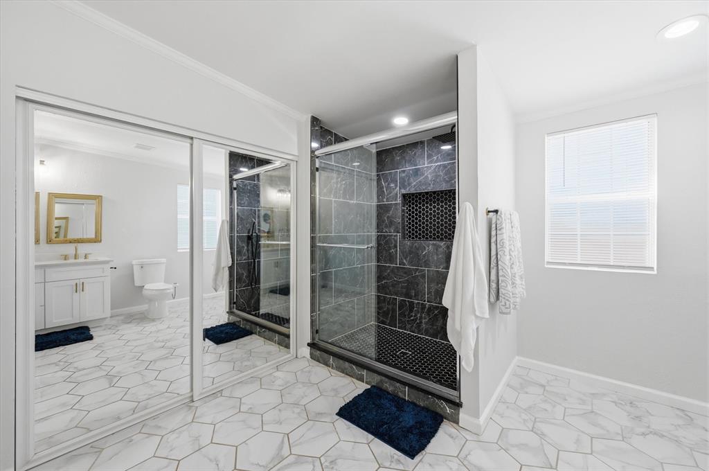 330 West Vinyard Road Duncanville, TX 75137 - Photo 13 of 20 a bathroom with a shower and a sink