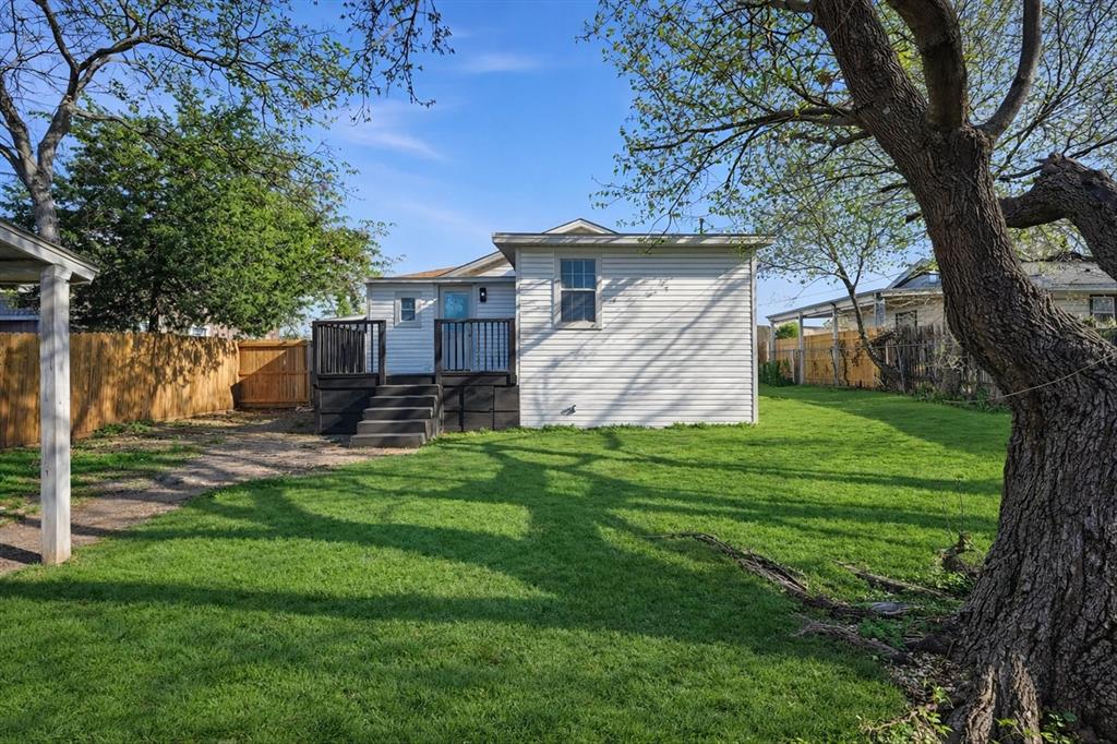 330 West Vinyard Road Duncanville, TX 75137 - Photo 20 of 20 a view of a house with a yard