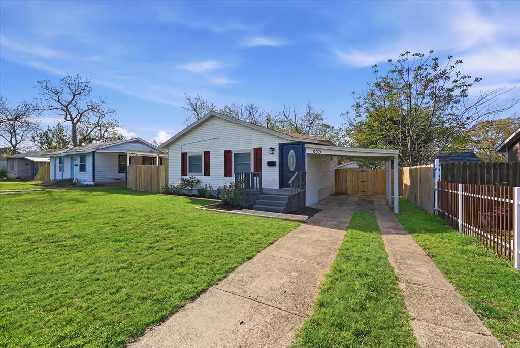 330 West Vinyard Road Duncanville, TX 75137 - Photo 2 of 20 front view of a house with a yard