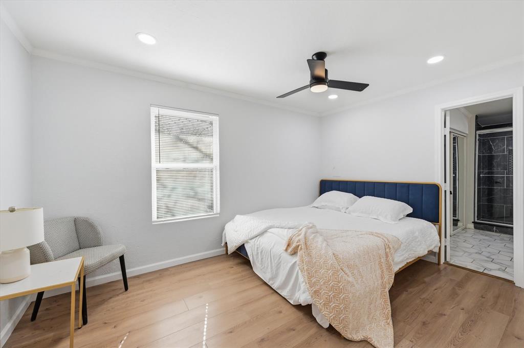 330 West Vinyard Road Duncanville, TX 75137 - Photo 9 of 20 a bedroom with a bed and a window