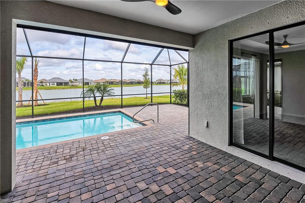 19576 The Pl Boulevard Estero, FL 33928 - Photo 18 of 35 a view of an empty room with a window