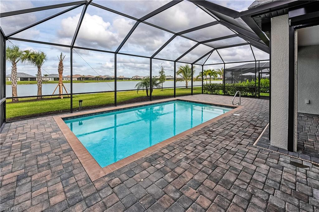 19576 The Pl Boulevard Estero, FL 33928 - Photo 19 of 35 a view of a backyard of a house