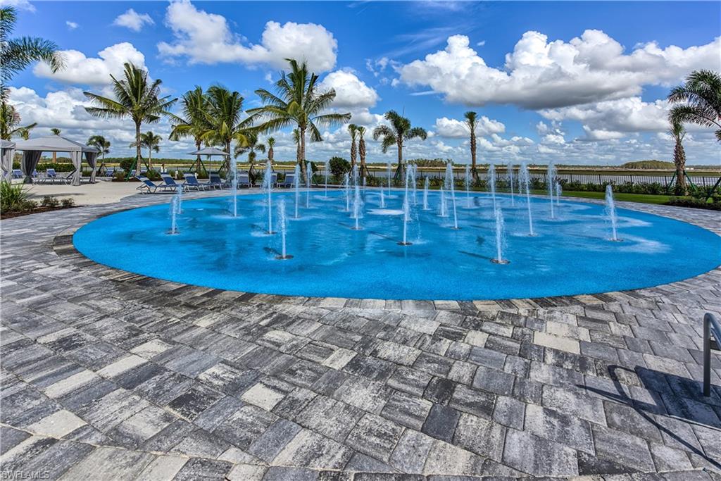 19576 The Pl Boulevard Estero, FL 33928 - Photo 28 of 35 a view of a swimming pool with an outdoor space