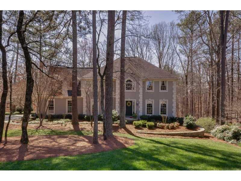 1890 Bridle Ridge Trace Roswell, GA 30075 - Photo 1 of 1 Exterior Front. A true beauty. You will love this beautifully landcaped home on a large private wooded lot. Wonderful living areas include 4 large bedrooms plus a bonus room! Formal living and dining rooms. Fireside family room and a fireside custom sunroom Full basement