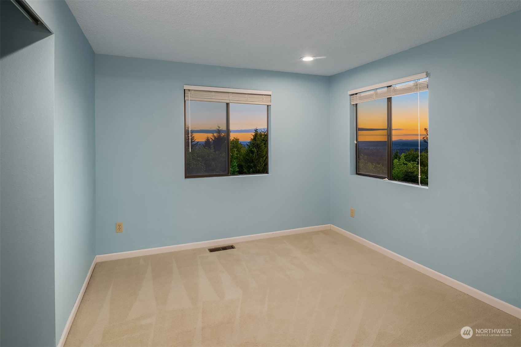17524 Southeast 102nd Street Renton, WA 98059 - Photo 24 of 38 an empty room with windows