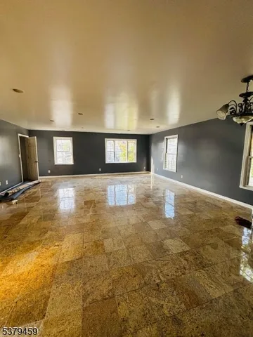 a view of a room window and a yard