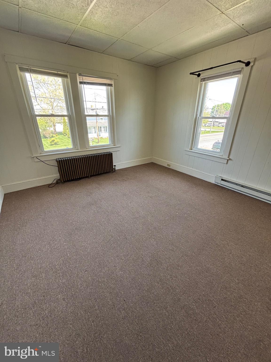 976 West Main Street, Unit 2 New Holland, PA 17557 - Photo 5 of 12 an empty room with windows