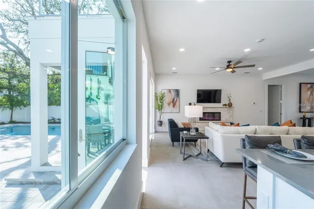 a front view of a house with yard and seating space