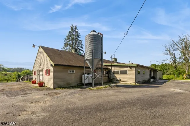 a view of a house with a big yard