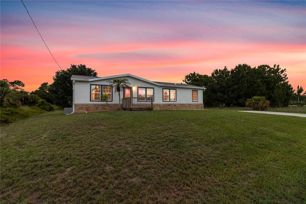 2261 Highlands Road Punta Gorda, FL 33983 - Photo 1 of 1 Ext Dusk