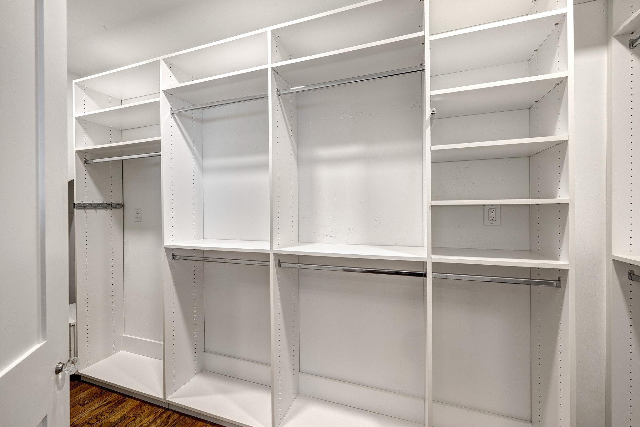 1314 Harvard Street Houston, TX 77008 - Photo 16 of 36 a view of walk in closet with empty racks