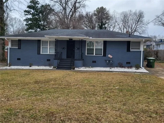 a house view with a swimming pool