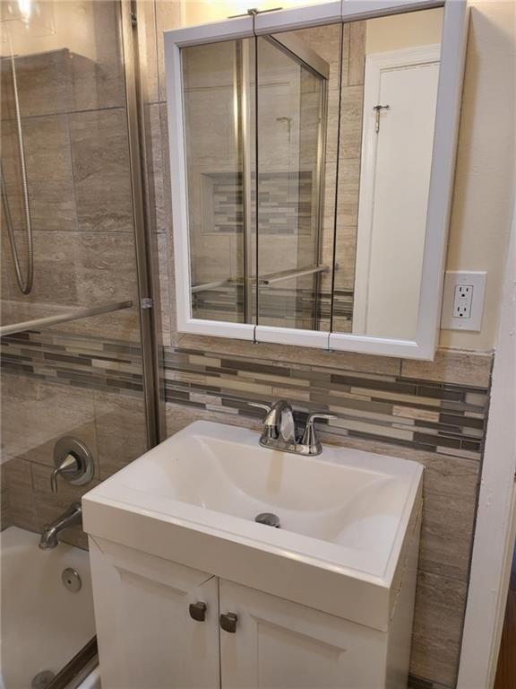 887 Bridgewater Street Southwest, Unit A Atlanta, GA 30310 - Photo 13 of 21 a bathroom with a sink and a mirror