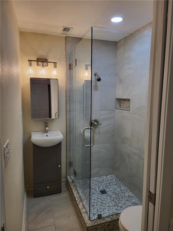 887 Bridgewater Street Southwest, Unit A Atlanta, GA 30310 - Photo 17 of 21 a bathroom with a sink shower and a mirror