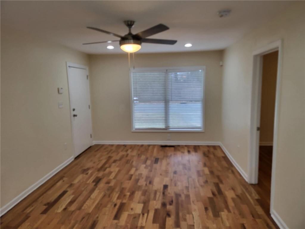 887 Bridgewater Street Southwest, Unit A Atlanta, GA 30310 - Photo 5 of 21 wooden floor in an empty room with a window