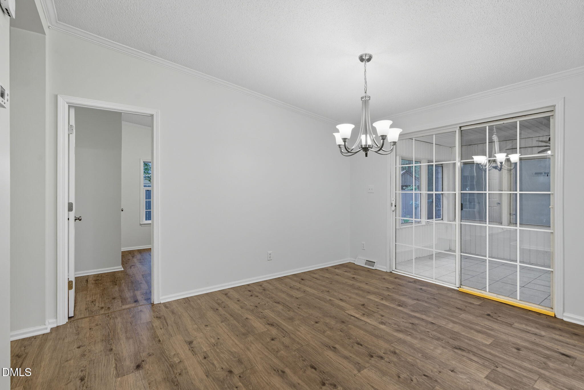 147 Ridge View Drive Cameron, NC 28326 - Photo 14 of 41 a view of a room with wooden floor and chandelier