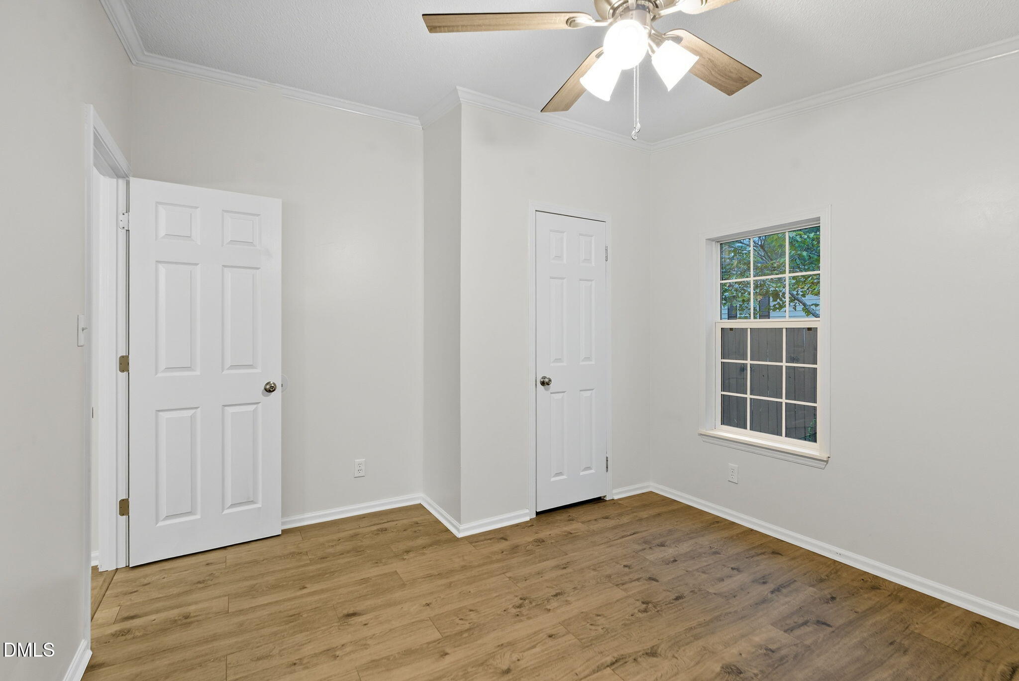 147 Ridge View Drive Cameron, NC 28326 - Photo 23 of 41 a view of an empty room with wooden floor and windows