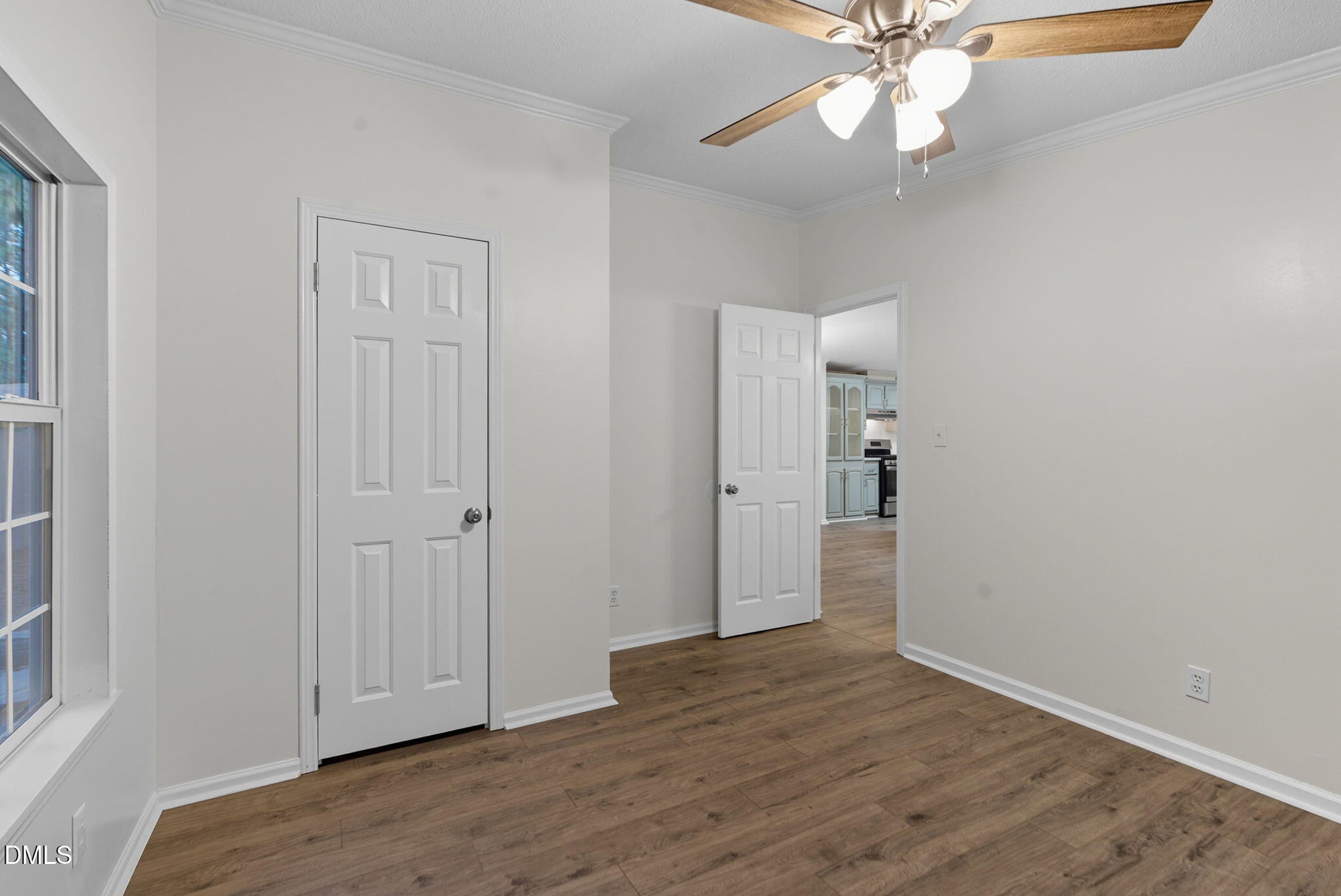 147 Ridge View Drive Cameron, NC 28326 - Photo 25 of 41 an empty room with wooden floor and fan