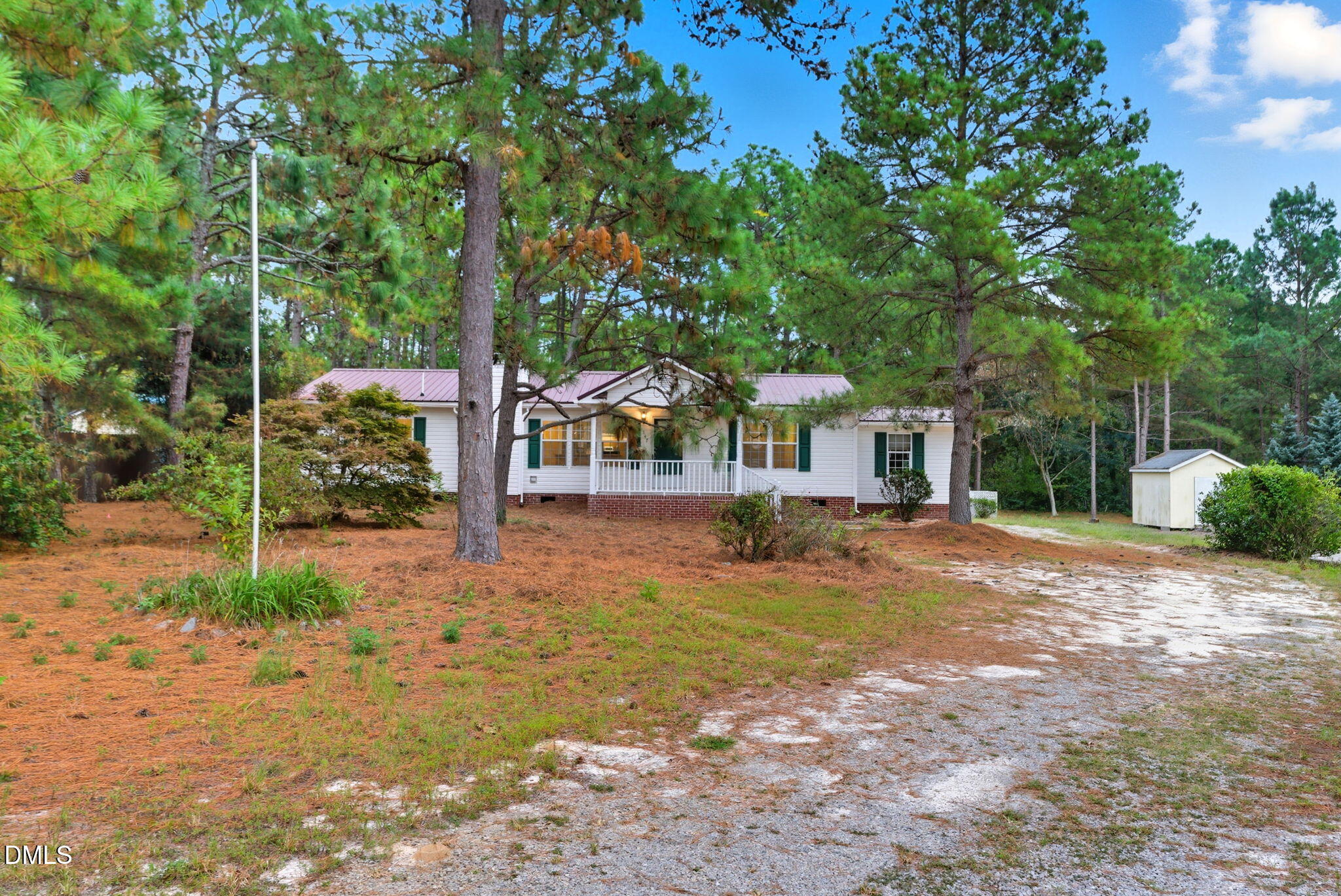 147 Ridge View Drive Cameron, NC 28326 - Photo 40 of 41 a view of a house with backyard and trees