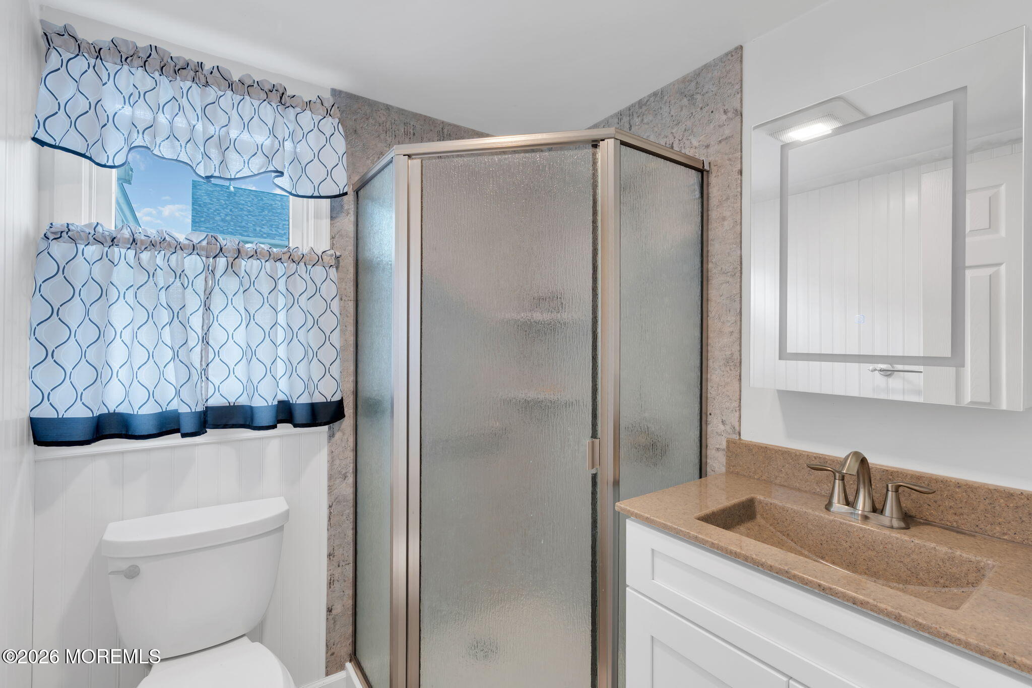 2908 Adams Street Wall, NJ 07719 - Photo 20 of 34 a bathroom with a sink toilet and shower