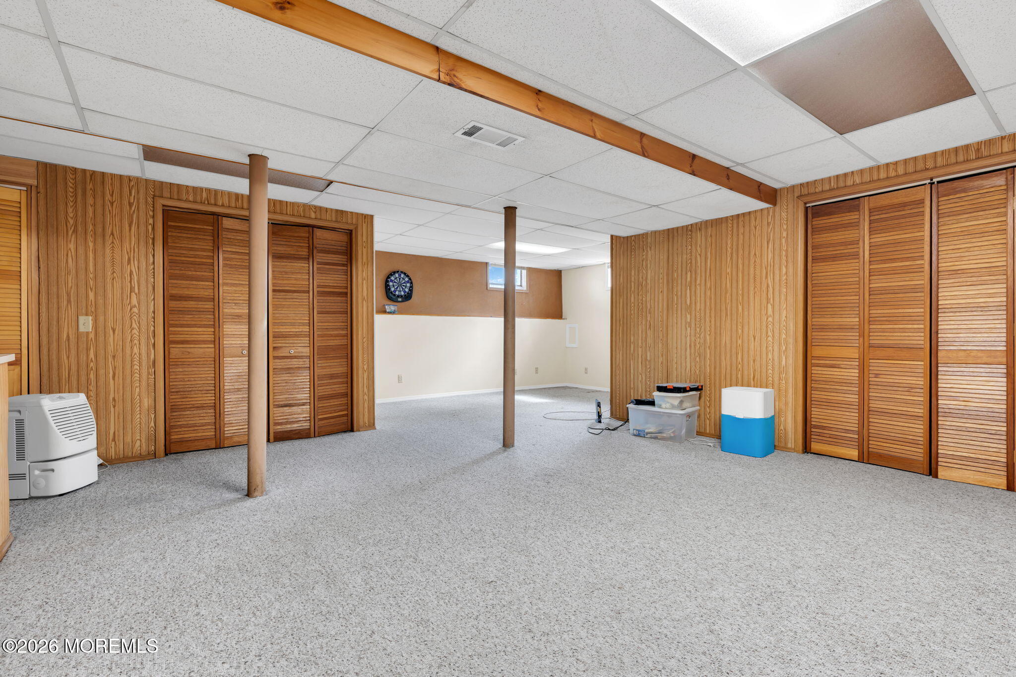 2908 Adams Street Wall, NJ 07719 - Photo 28 of 34 an empty room with furniture and a ceiling fan