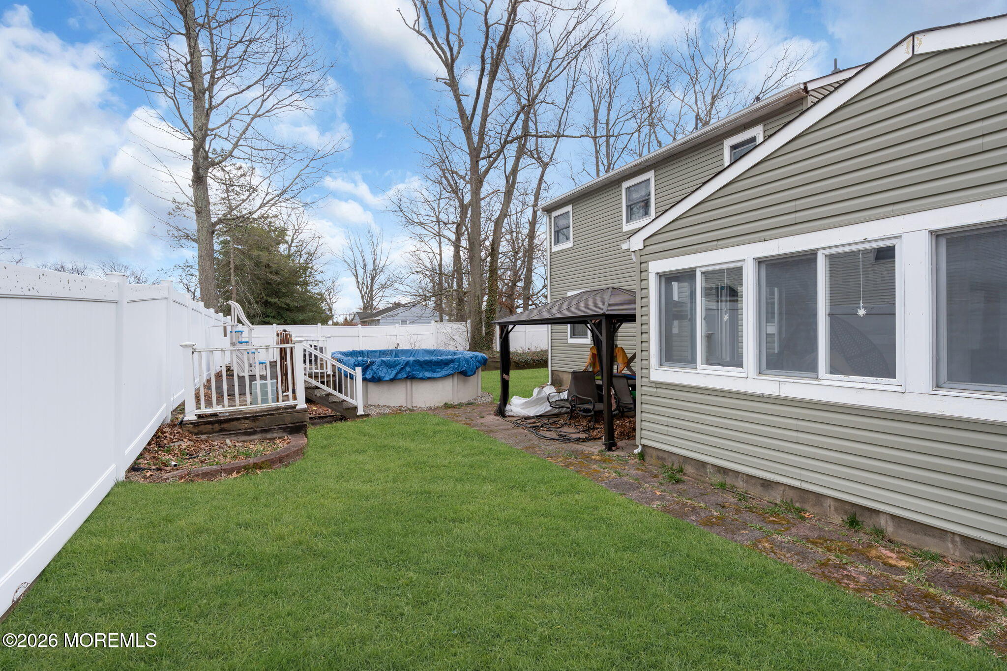 2908 Adams Street Wall, NJ 07719 - Photo 31 of 34 a view of a house with backyard and sitting area