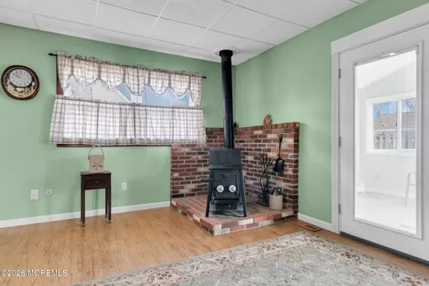 a room with fireplace and window