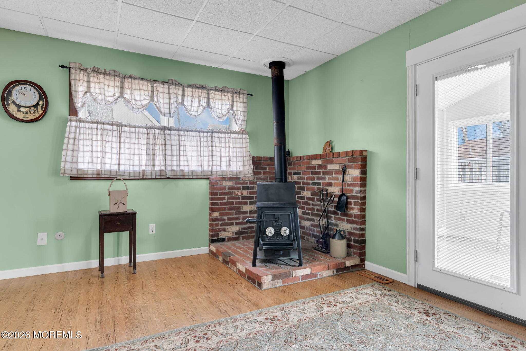 2908 Adams Street Wall, NJ 07719 - Photo 10 of 34 a room with fireplace and window