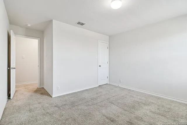 an empty room with an entryway