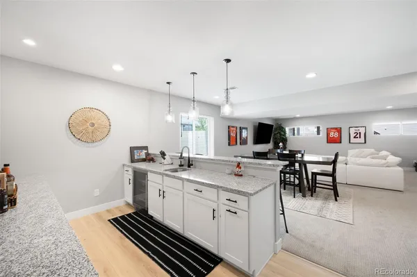 a kitchen with a table and chairs in it