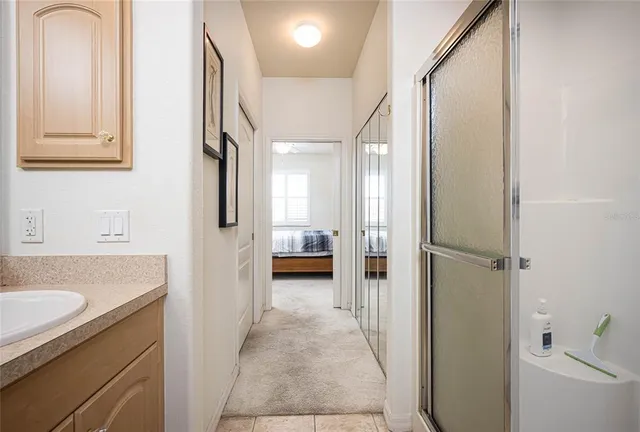 a bathroom with a tub and a sink