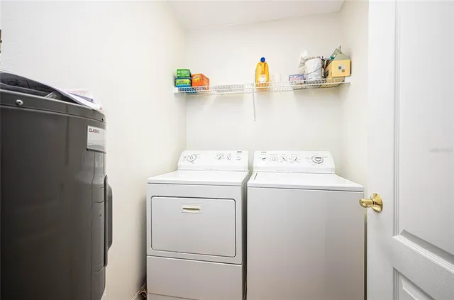 a utility room with dryer and washer