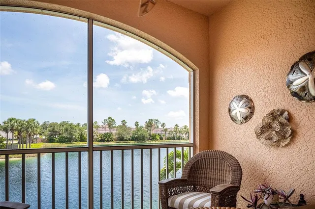 a view of a balcony with chair