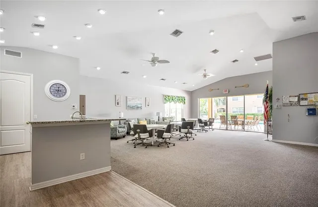 a very nice looking living room with a large window