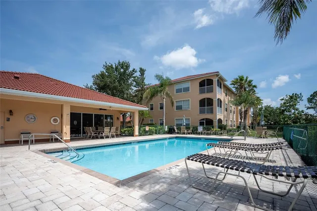 a front view of house with yard and outdoor seating
