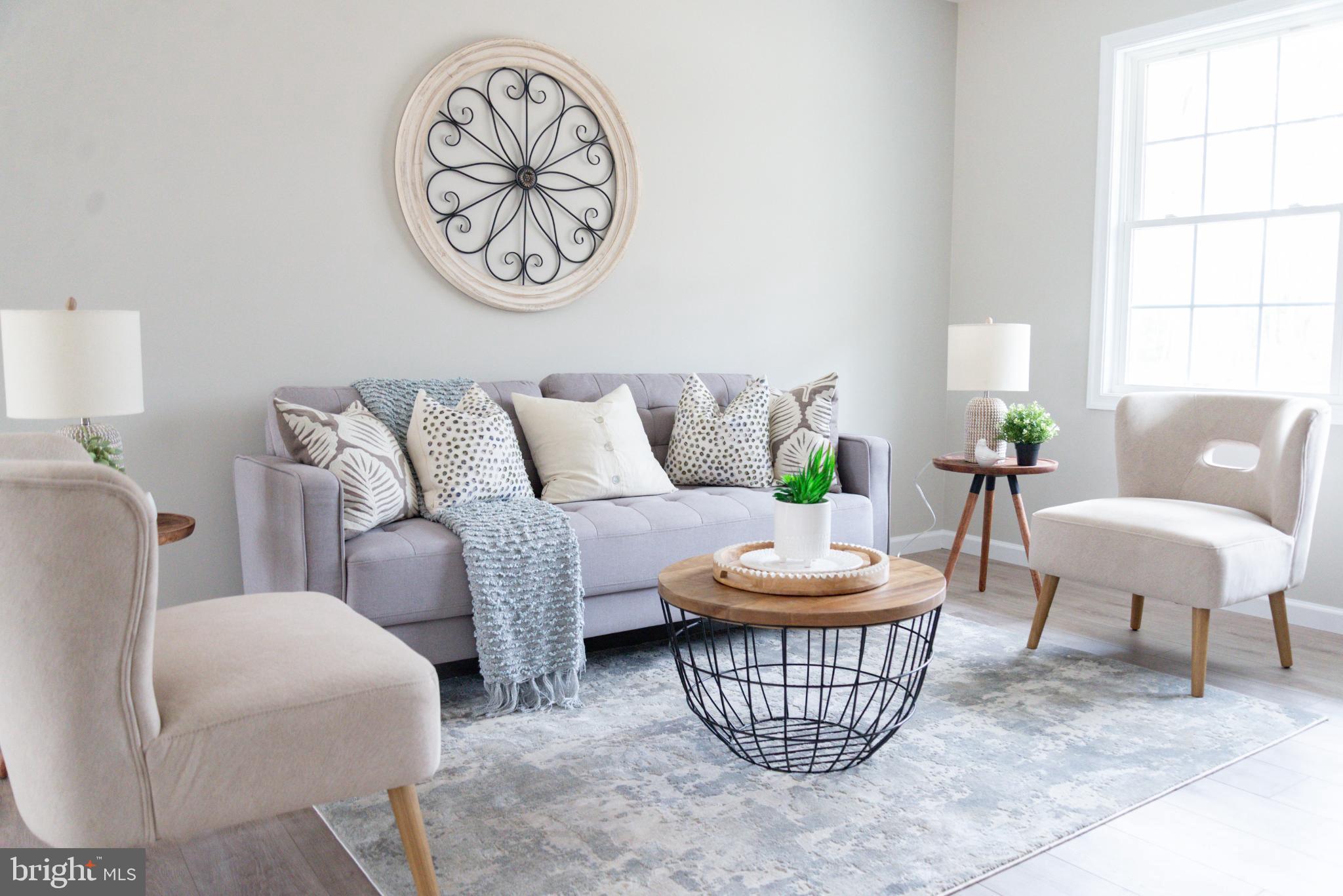 227 Forest Grove Road Colonial Beach, VA 22443 - Photo 4 of 22 a living room with furniture and a window
