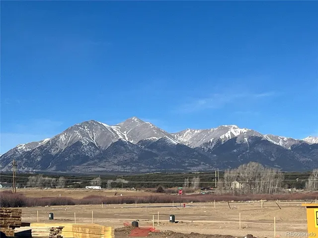 a view of house with mountain view