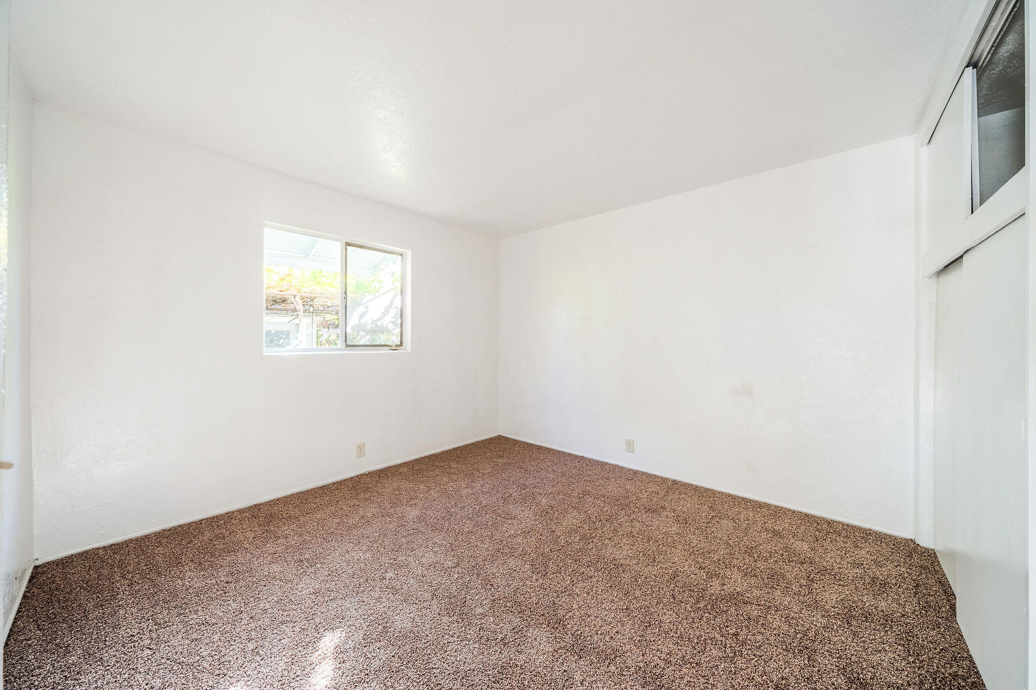 1138 Layton Road Redding, CA 96002 - Photo 12 of 22 an empty room with windows