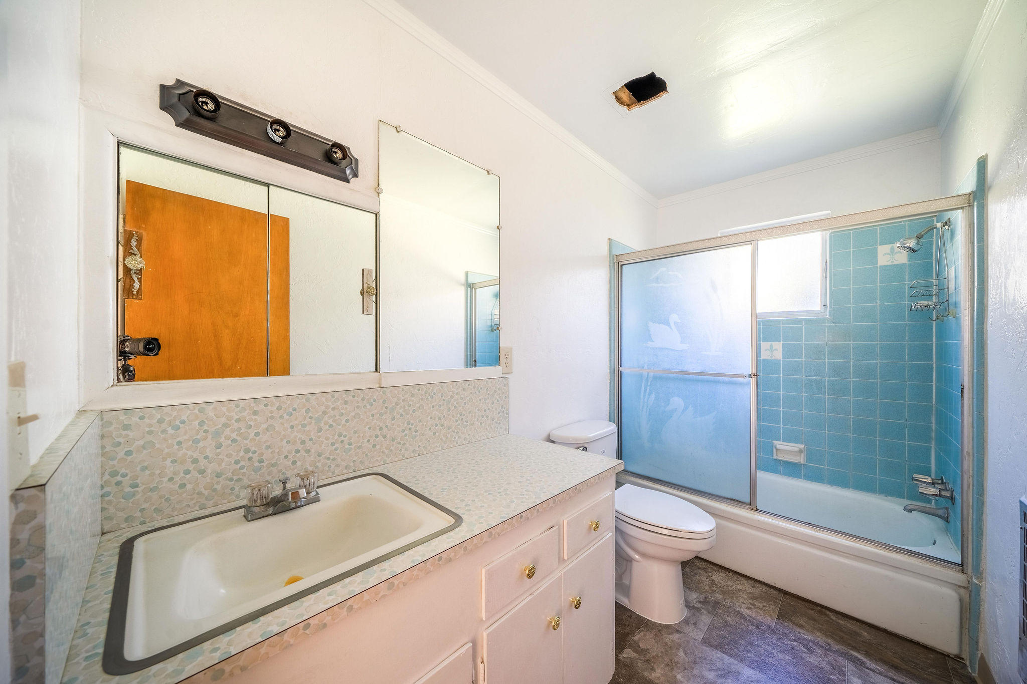 1138 Layton Road Redding, CA 96002 - Photo 14 of 22 a bathroom with a granite countertop sink toilet and shower