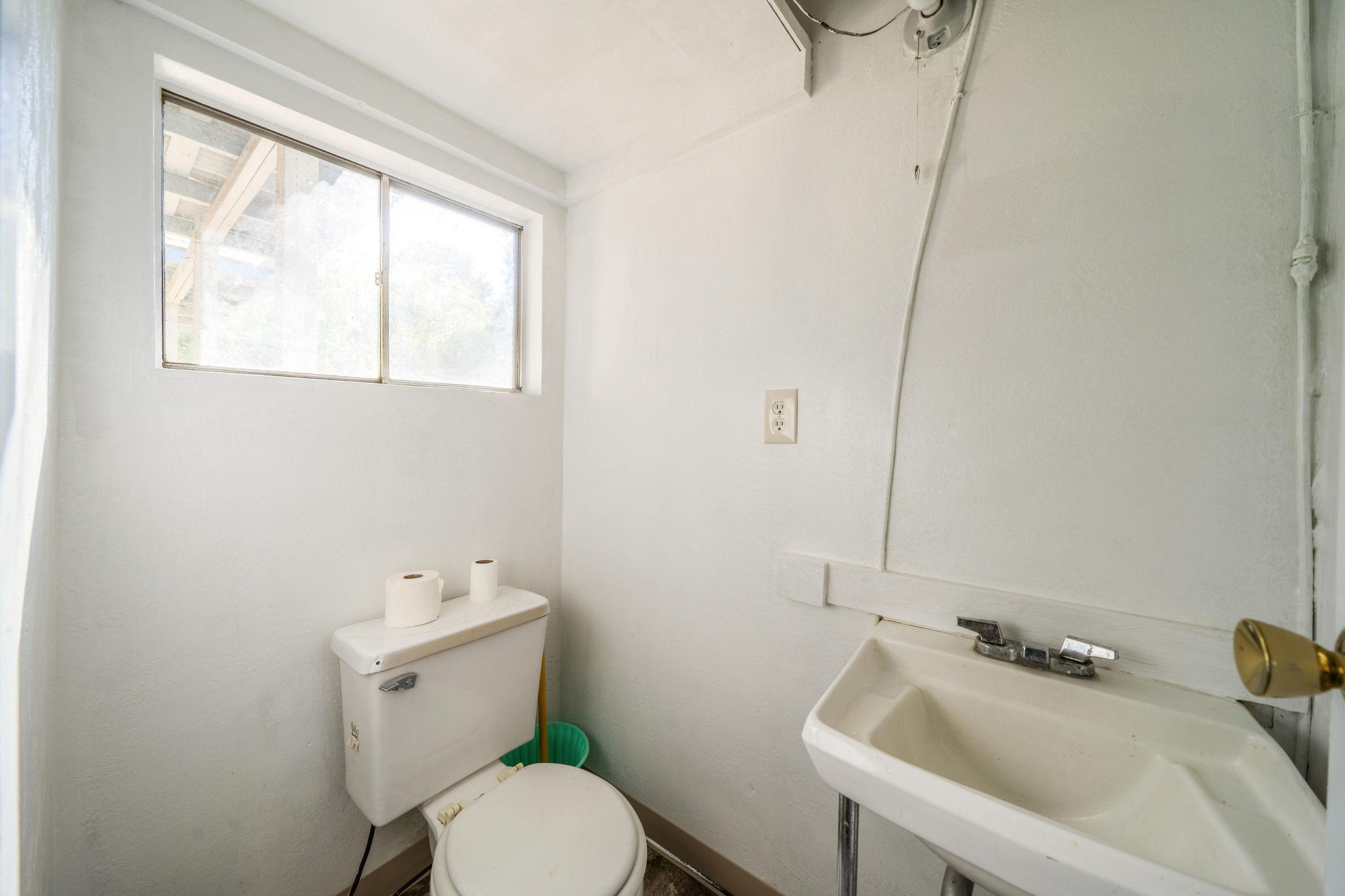 1138 Layton Road Redding, CA 96002 - Photo 16 of 22 a bathroom with a sink and a toilet