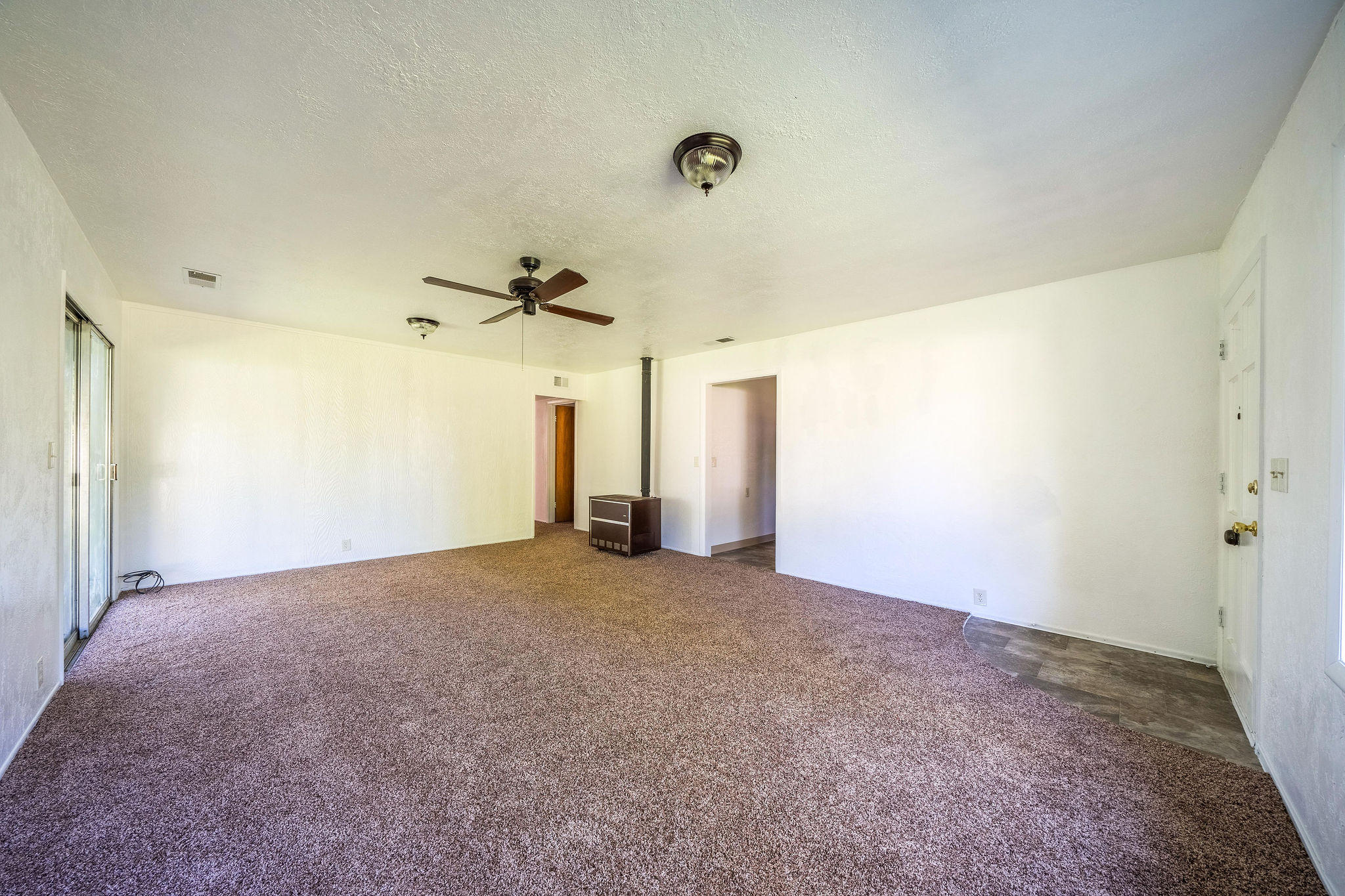1138 Layton Road Redding, CA 96002 - Photo 4 of 22 a view of a big room with a ceiling fan