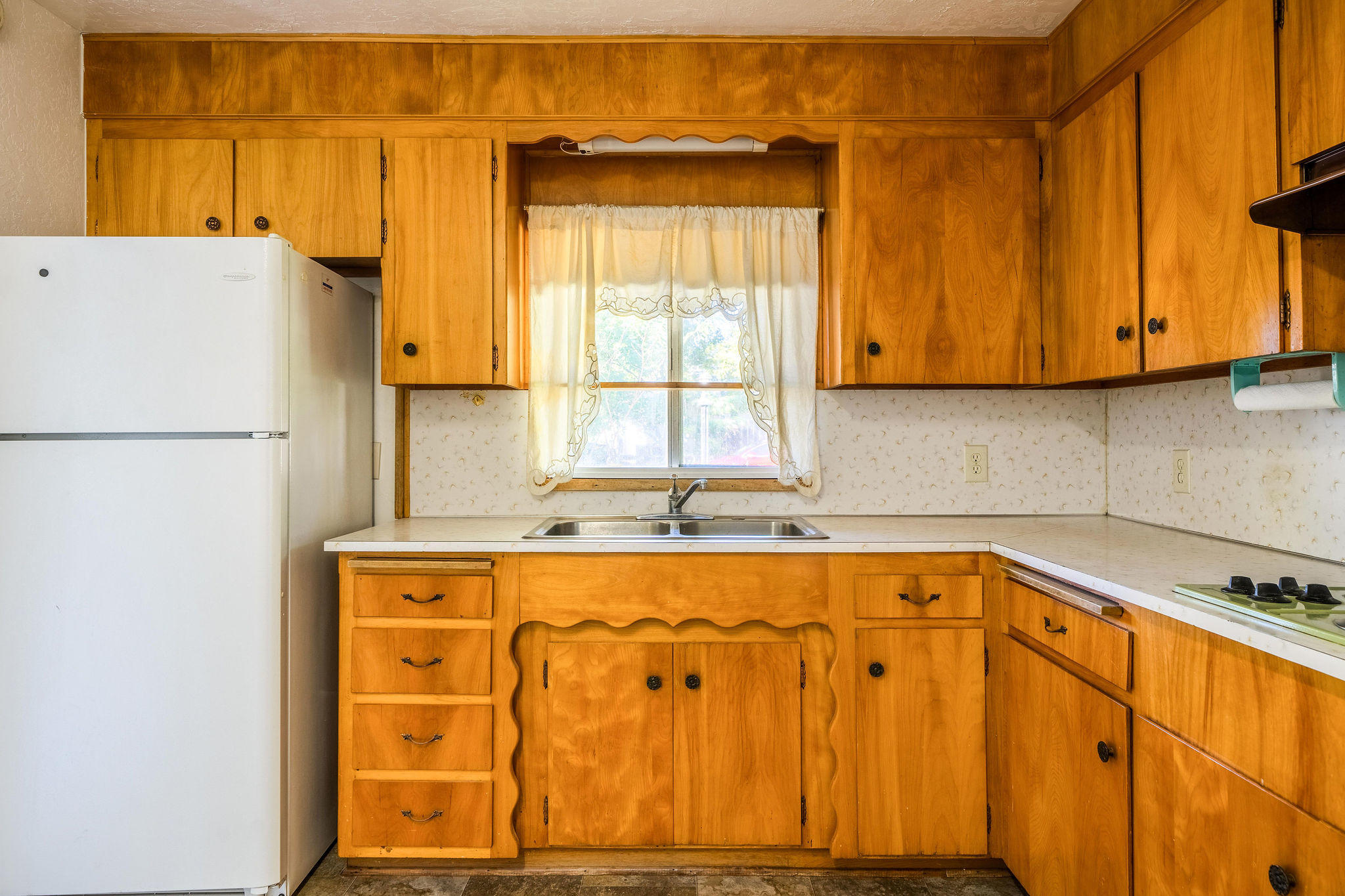 1138 Layton Road Redding, CA 96002 - Photo 9 of 22 a view of a kitchen with a window