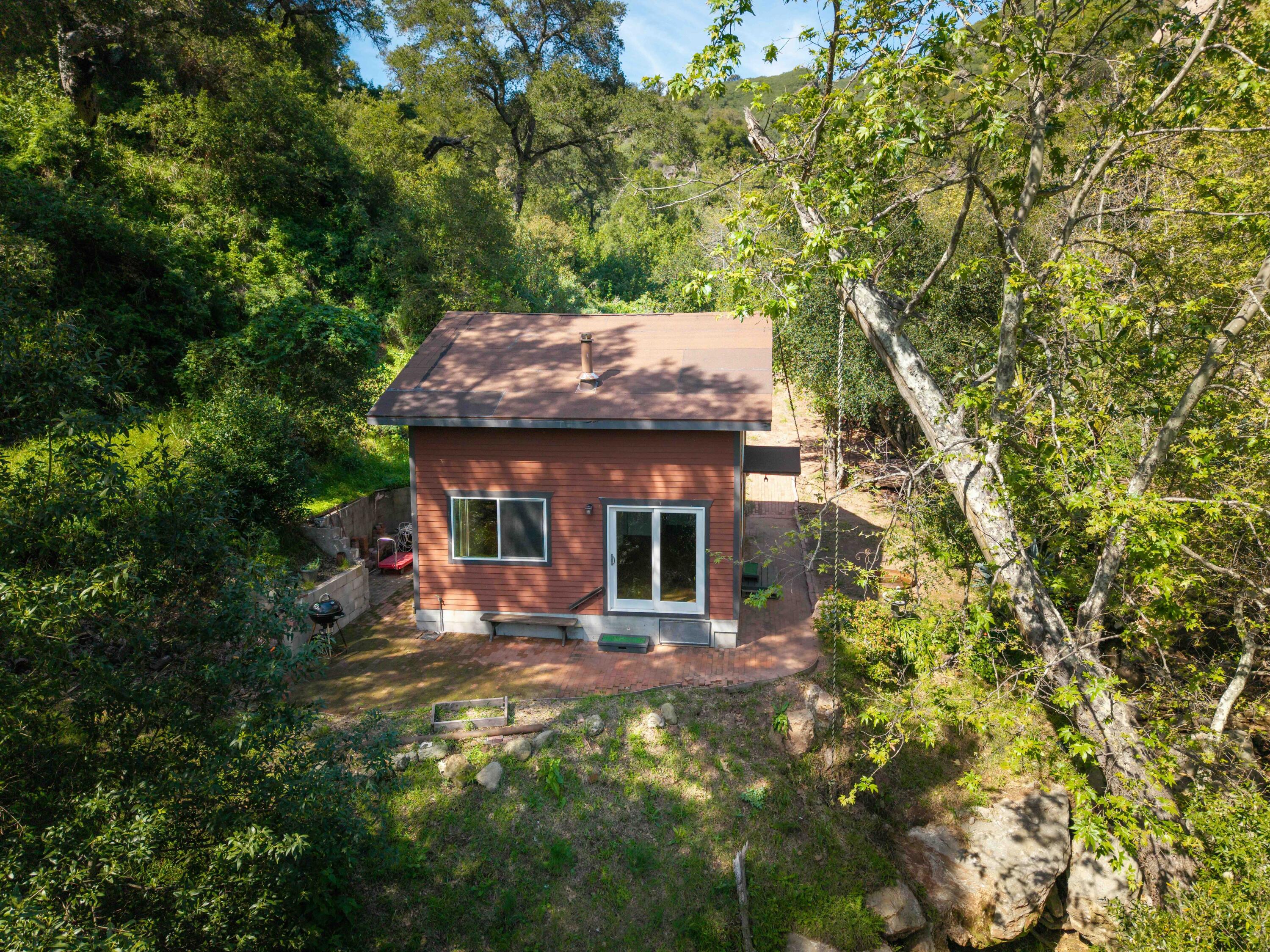 2011 North San Marcos Road Santa Barbara, CA 93105 - Photo 18 of 41 a view of a house with a tree and a yard
