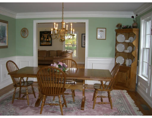 63 Silvermine Road Boxford, MA 01921 - Photo 5 of 15 a view of a dining room with furniture and chandelier