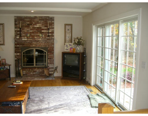 63 Silvermine Road Boxford, MA 01921 - Photo 8 of 15 a living room with furniture and a fireplace