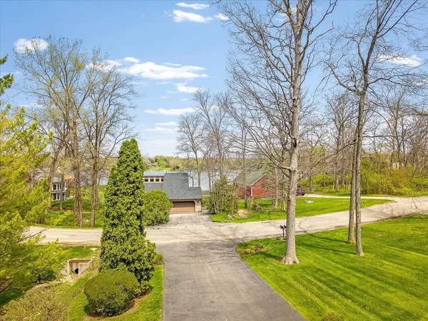 a view of a wooden deck with back yard